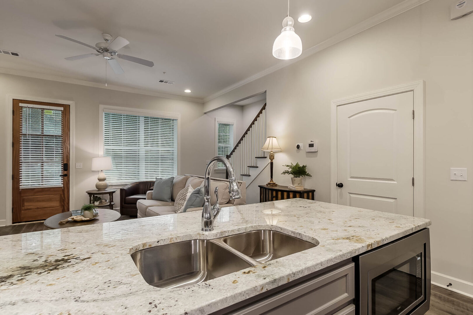 A sink in the kitchen island