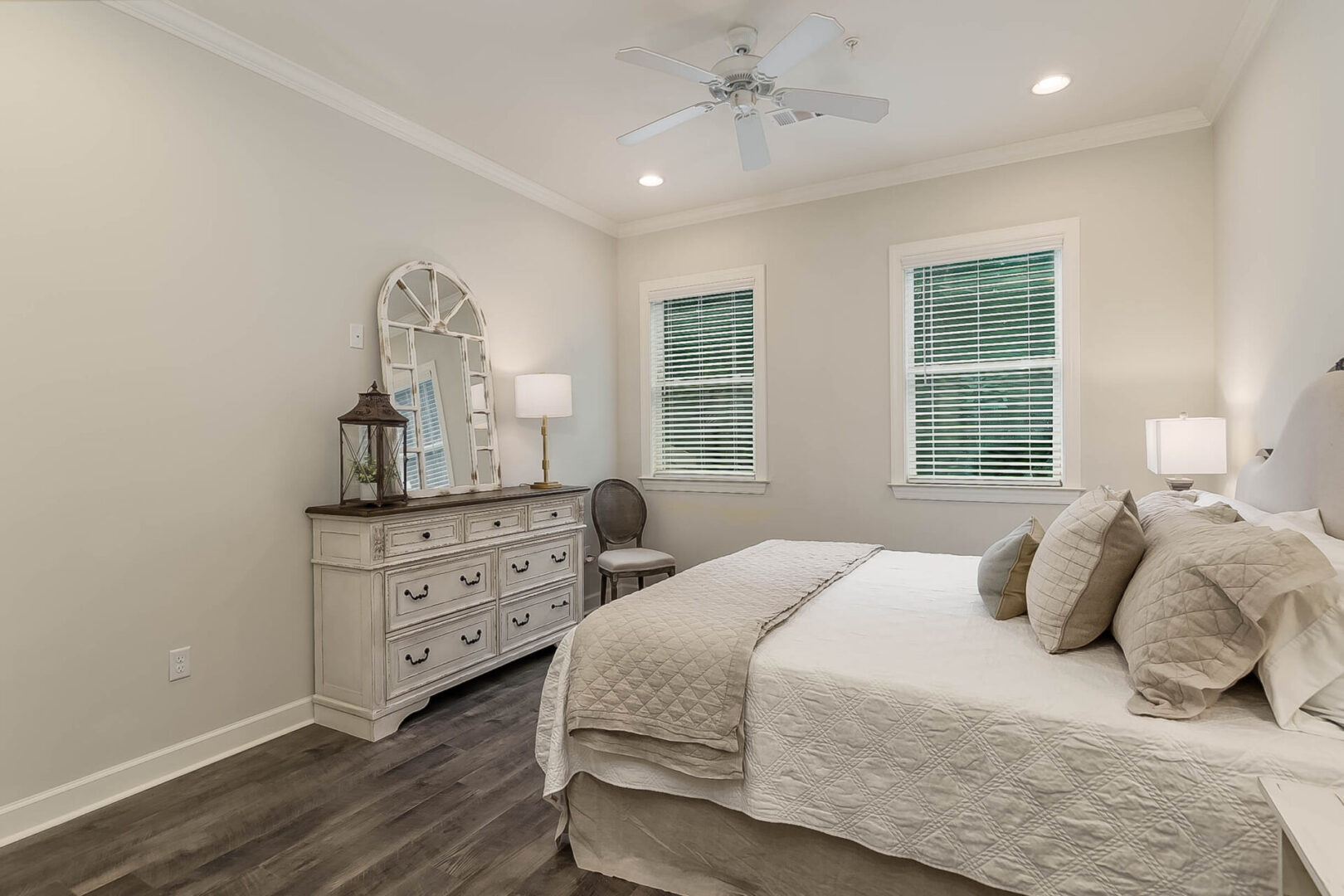 A bedroom with a vanity table