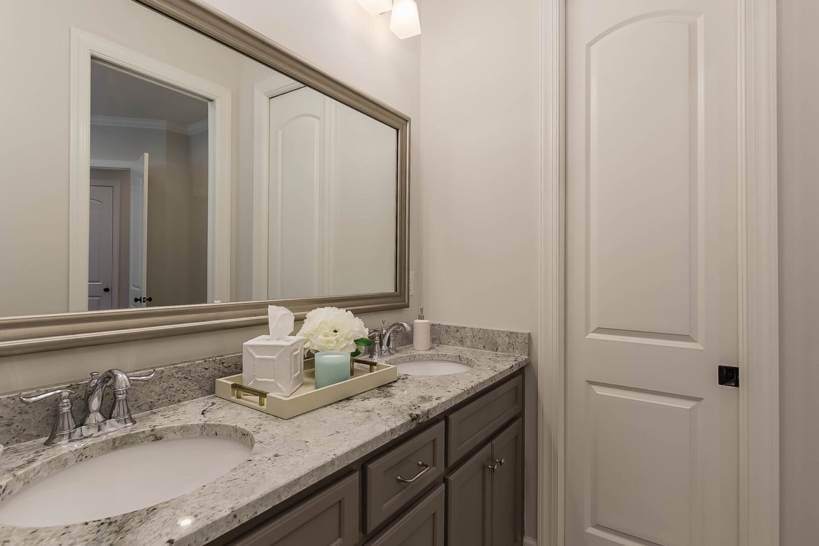 A bathroom with a narrow door