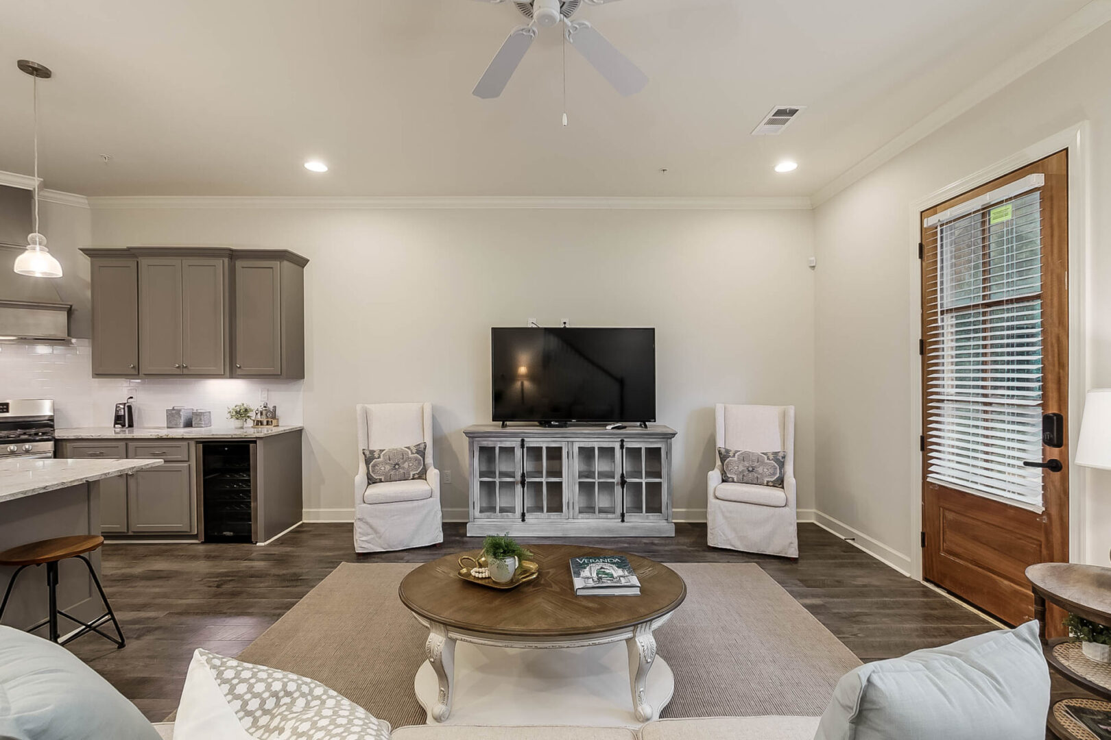 A living area connected to a kitchen